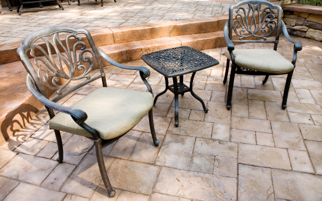 Charming backyard stamped concrete patio in Cincinnati, OH, with a natural finish.